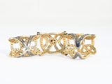 two gold and silver bracelets with the word love written on them