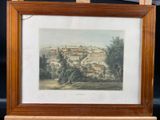 an old picture of a picture of a village in a wooden frame