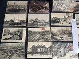 many old postcards that are on a table