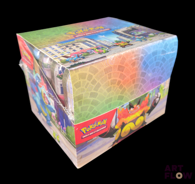 a box of pokemon trading cards sitting on top of a table