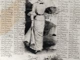 a black and white photo of a woman holding an umbrella