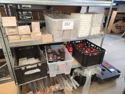 many boxes of sodas and cans on the shelves