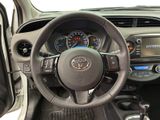 the interior of a car with a steering wheel and dashboard controls