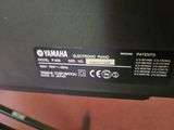 the back of a yamaha motorcycle with a sticker on it ' s side