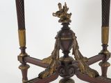 a table that has two candles on top of it