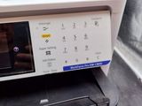 a printer that is sitting on top of a table