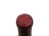 a bottle of wine that is sitting on a table