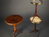 pair of antique side tables on pedestals with a tray on top