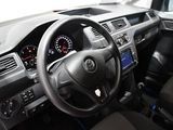 dashboard of a car with a steering wheel and dashboard controls