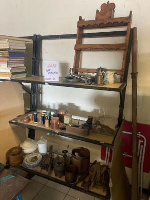 a shelf that has many different items on it