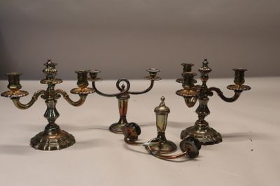three candles that are sitting on a table