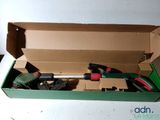a box with tools inside of it on a table