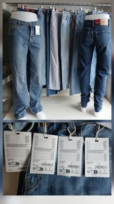 a display of men ' s jeans on display in a store