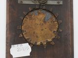 a picture of a clock hanging on a wall