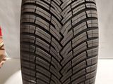 a close up of a tire on a white surface