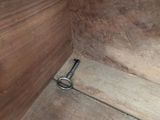 a pair of scissors sitting on the floor of a room