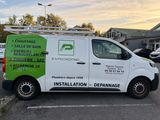 the van is parked in the parking lot with its door open