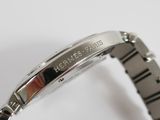 an image of a close up of a watch on a white surface