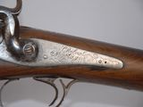 an old gun that has been engraved with the name of a soldier