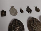 a lot of silver items that are on the table
