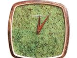 a green square watch with a red hands on a white background