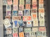 a picture of a display of stamps in a glass case