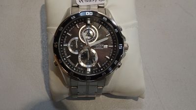 a watch that is sitting on top of a display