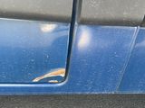 a close up of a car ' s door handle and the door handle is missing