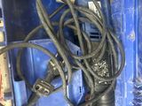 a blue tool box with a bunch of tools inside of it
