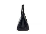 a black leather handbag on a white background
