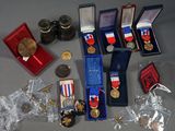 many medals and other items that are on the table