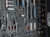 many tools in the tool box on the table