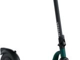 an image of a green scooter on a white background