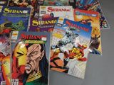 a lot of comic books that are on the table