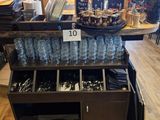 a table with a lot of bottles on it in a store