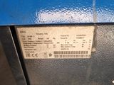 an image of a parking meter with a sticker on it