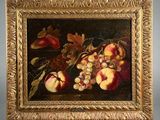 painting of a still life of apples and grapes in a gold frame