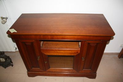 a wooden table with a drawer on top of it