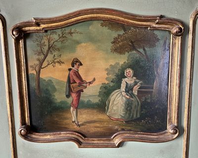 un tableau accroché au mur d'une pièce, représentant un homme et une femme