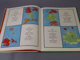an open book with pictures of different animals on it