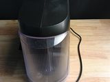 an image of a blender sitting on a wooden table