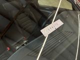a sticker on the windshield of a car that says private