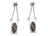 deux paires de boucles d'oreilles ornées de rayures noires et blanches