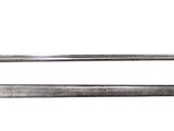 a picture of a pair of swords on a white background