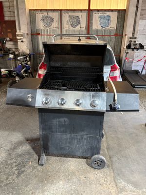 an image of a bbq grill in a garage