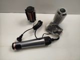 a hair dryer and a blow dryer sitting on a table