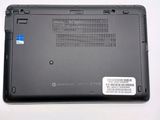 a black laptop with a blue sticker on it