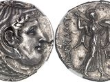 a silver coin with an image of a woman on it