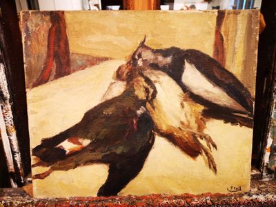 a painting of a couple of birds on a table