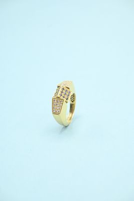 a close up of a gold ring with diamonds on it